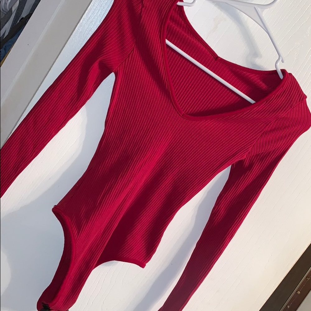 Red, ribbed long sleeve bodysuit